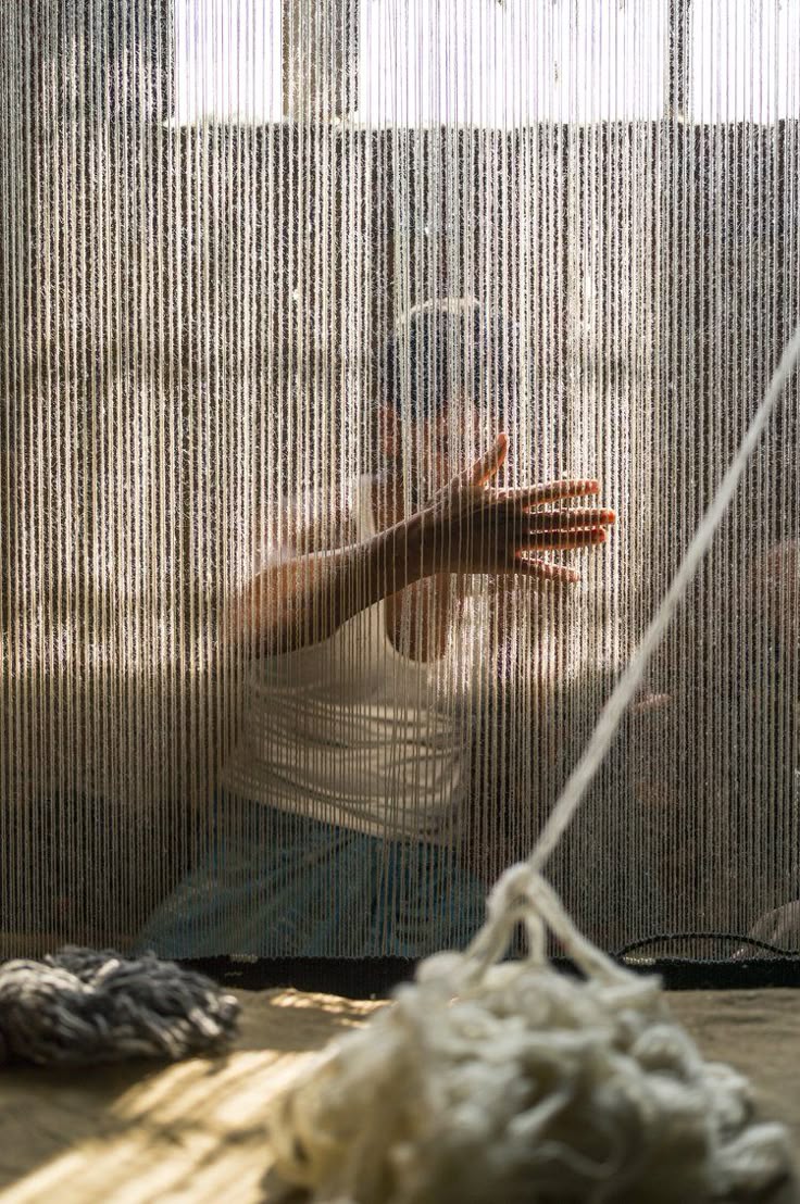 Artisan working at a loom
